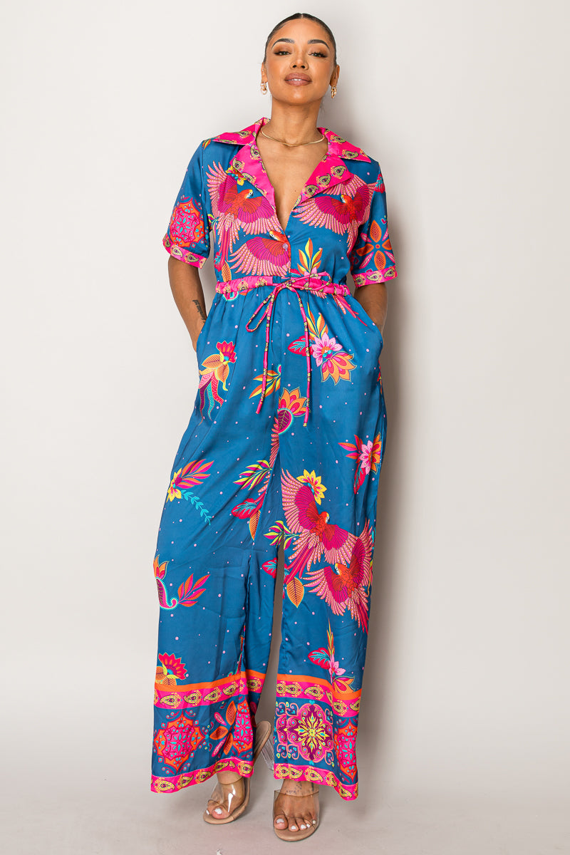 Model in vibrant resort co-ord with drawstring waist and wide-leg pants