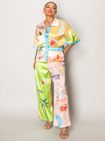 Endless Moon resort wear set with tropical fruit and beach prints