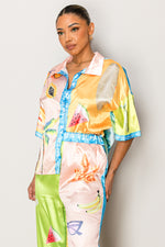 Colorful short-sleeve co-ord perfect for summer resort collections