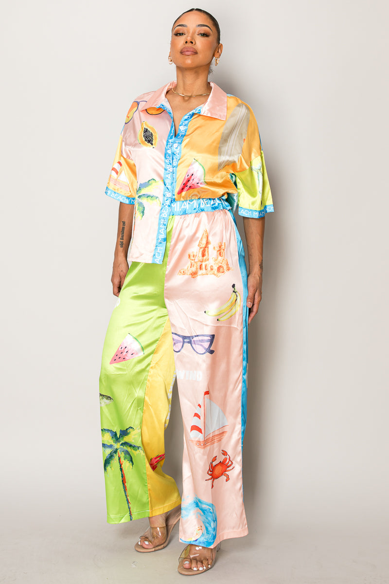 Model wearing pastel tropical resort wear from Endless Moon