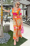 Eye-catching tropical jumpsuit with animal and floral patterns