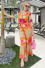 Eye-catching tropical jumpsuit with animal and floral patterns