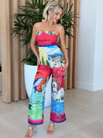 Resort-ready look with island scenes, whales, and blooming bougainvillea.