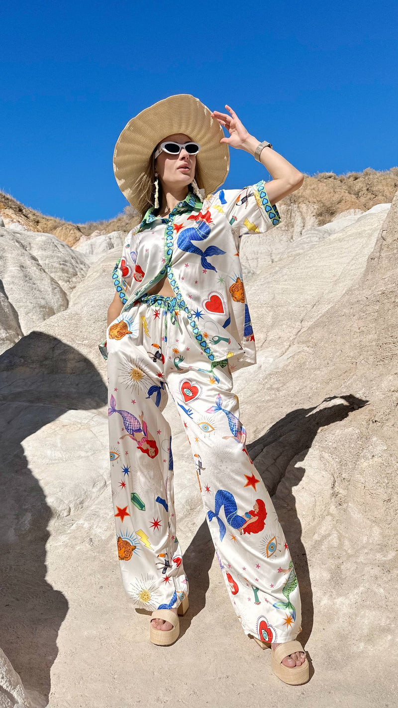 Woman in Endless Moon summer lounge set featuring mermaids and stars