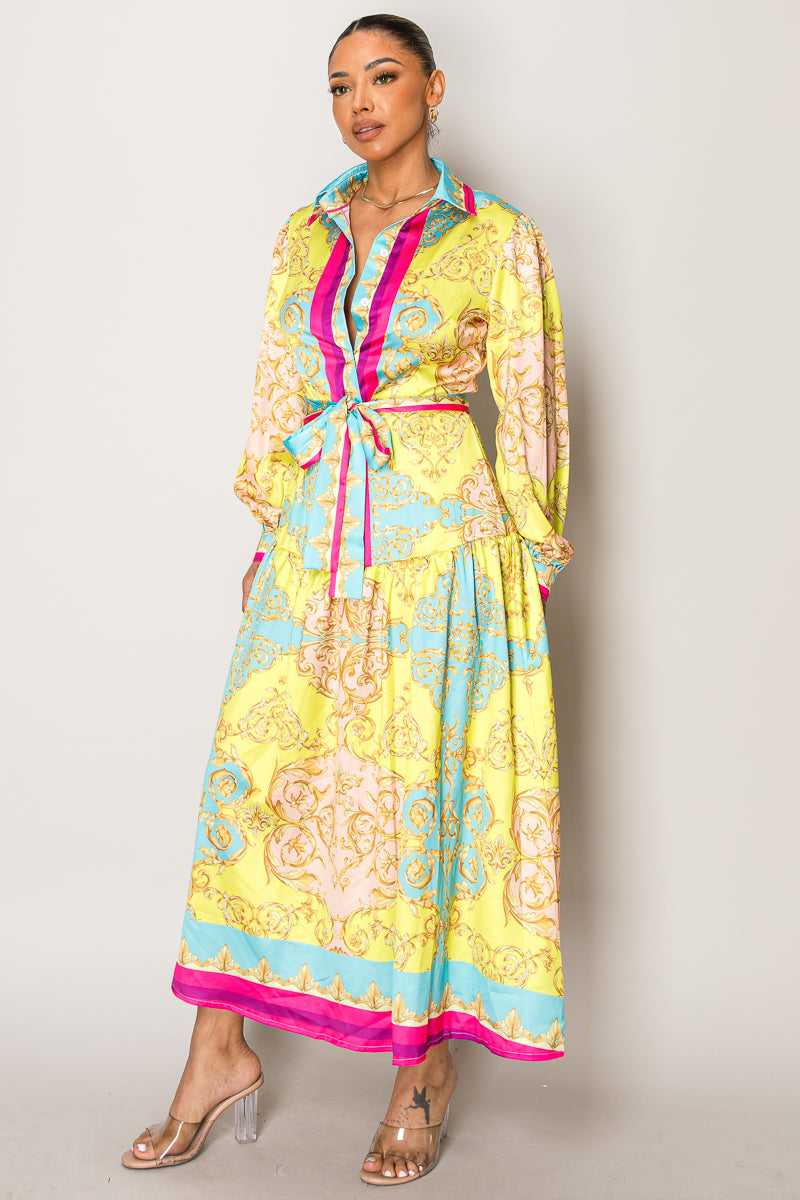 Wholesale maxi dress featuring yellow, blue, and gold ornate design