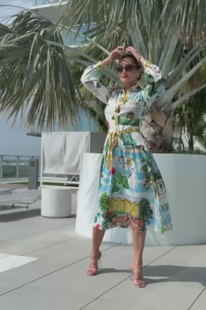 Elegant button-down resort dress with statues and architecture print