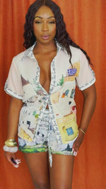 Mediterranean print set with drawstring shorts and scenic top.